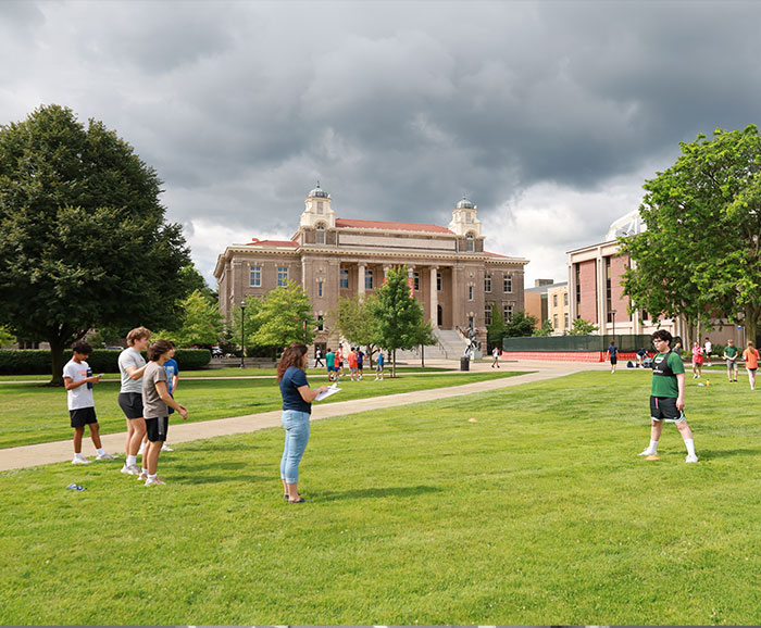 students outside on a cloudy day