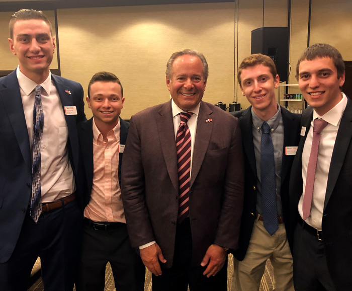 Syracuse University Trustee and alumnus Andrew T. Berlin with four Syracuse University sport analytics majors and Berlin Scholars