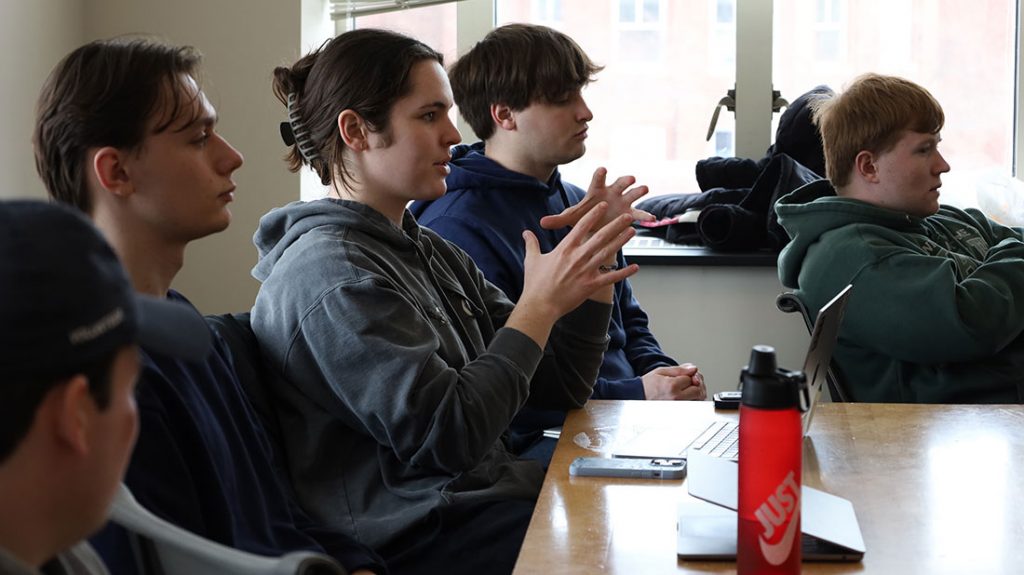 two students sitting in classroom