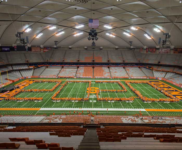 Students are posed as the number 2020 on the dome court