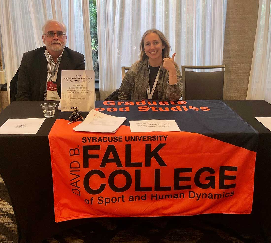 Professor Welsh and graduate student Tynan at Cornell conference