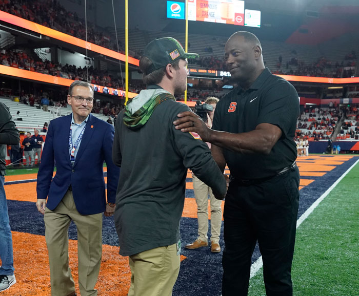 David shakes coach Babers hand on the field