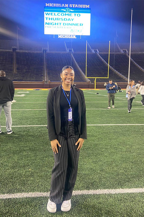 Elena Randolph stands in a stadium