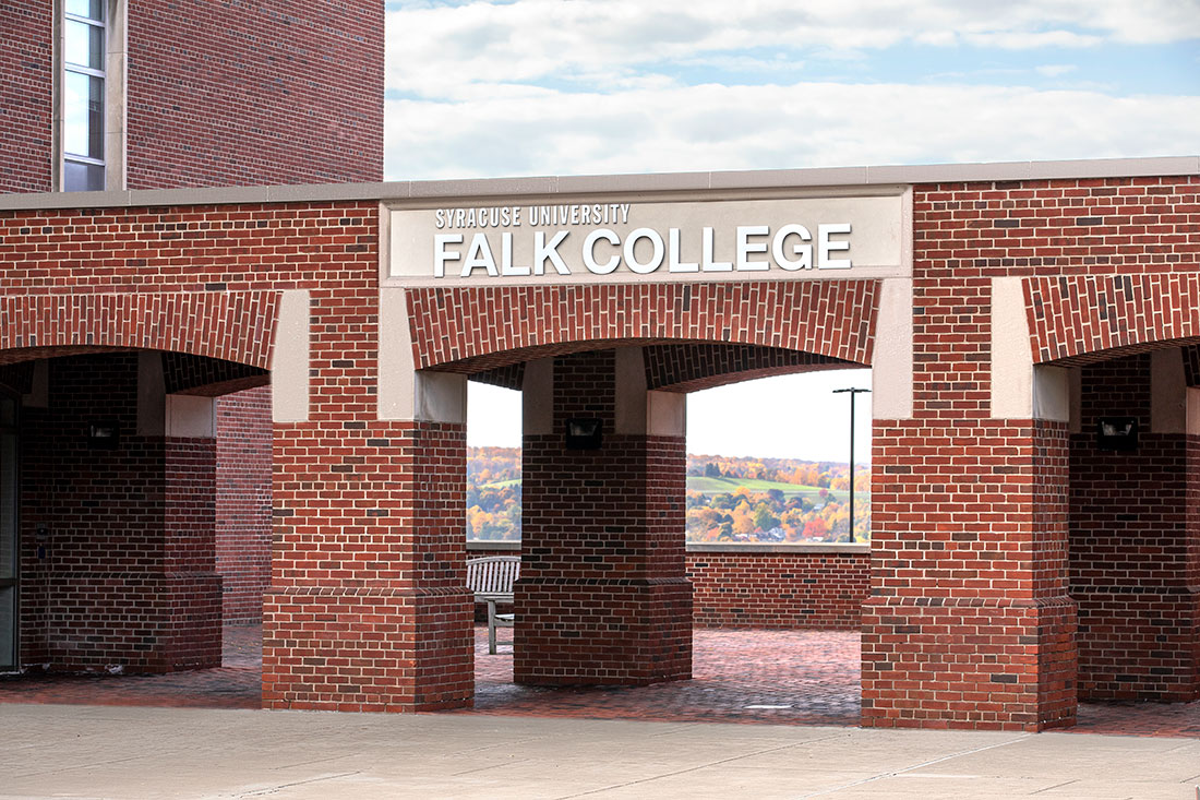 Exterior of Falk college facing patio