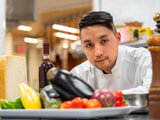 Nutrition student Justin Pascual in the Susan R. Klenk Learning Café and Kitchens