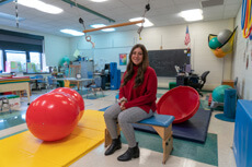 Madalyn Tallo in a classroom at her internship.