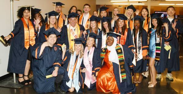 Graduates celebrating at 2024 Falk College Convocation.