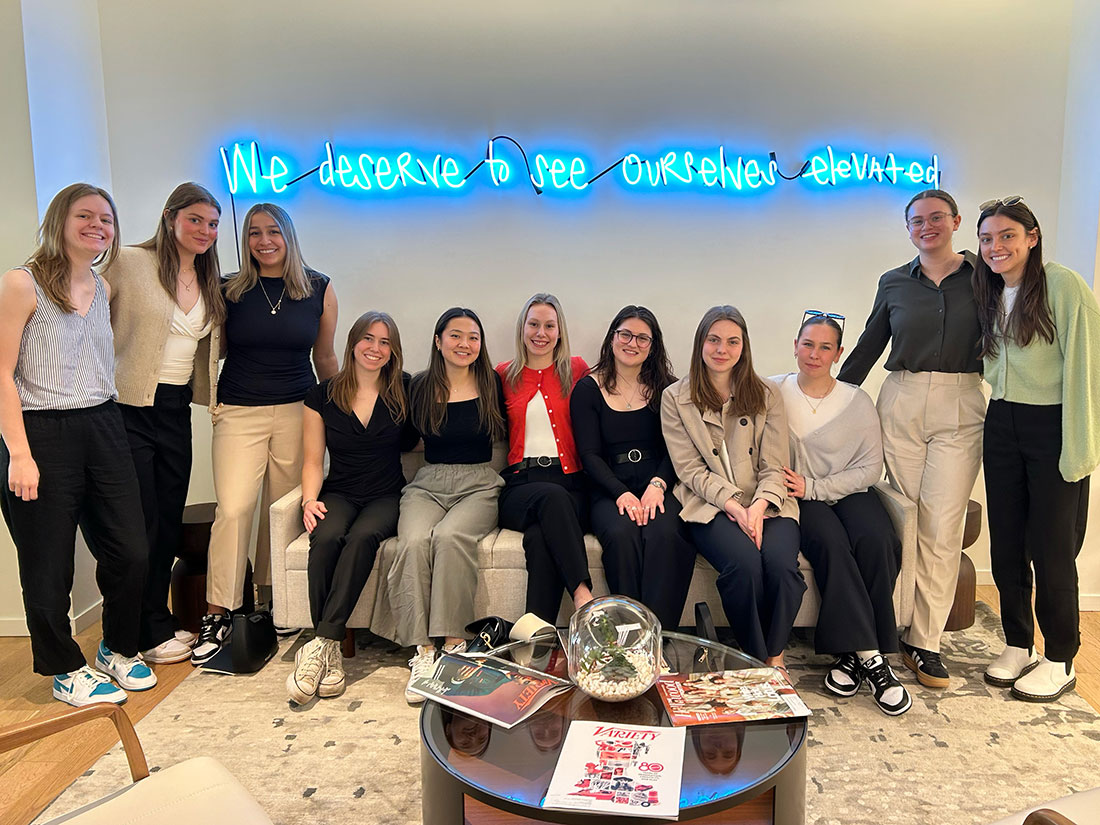 Sport group in Atlanta sitting and standing together