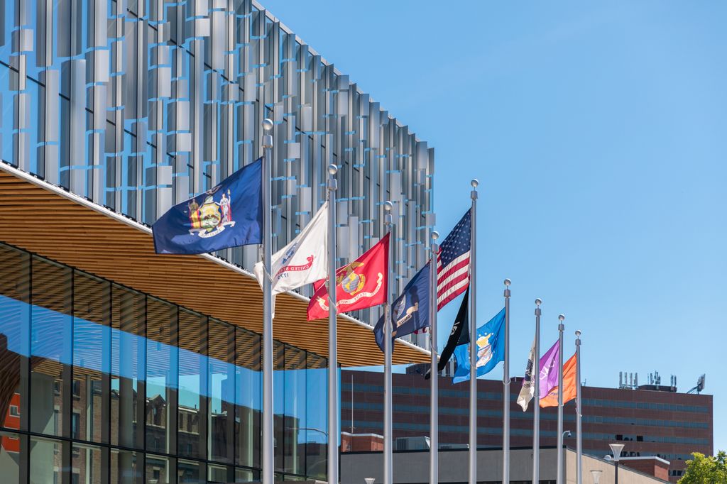 flags flying in front of IVMF