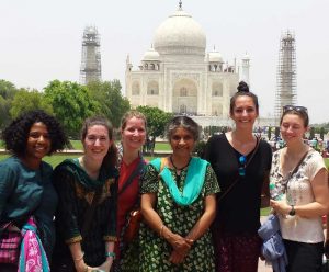 NSD students are posed with professor in front of the Taj Mahal