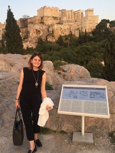 Jennifer LoPiccolo poses with a view of the Parthenon in the distance