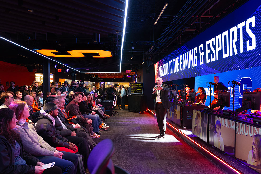 Esports Joey Gawrysiak addresses the audience at the grand opening