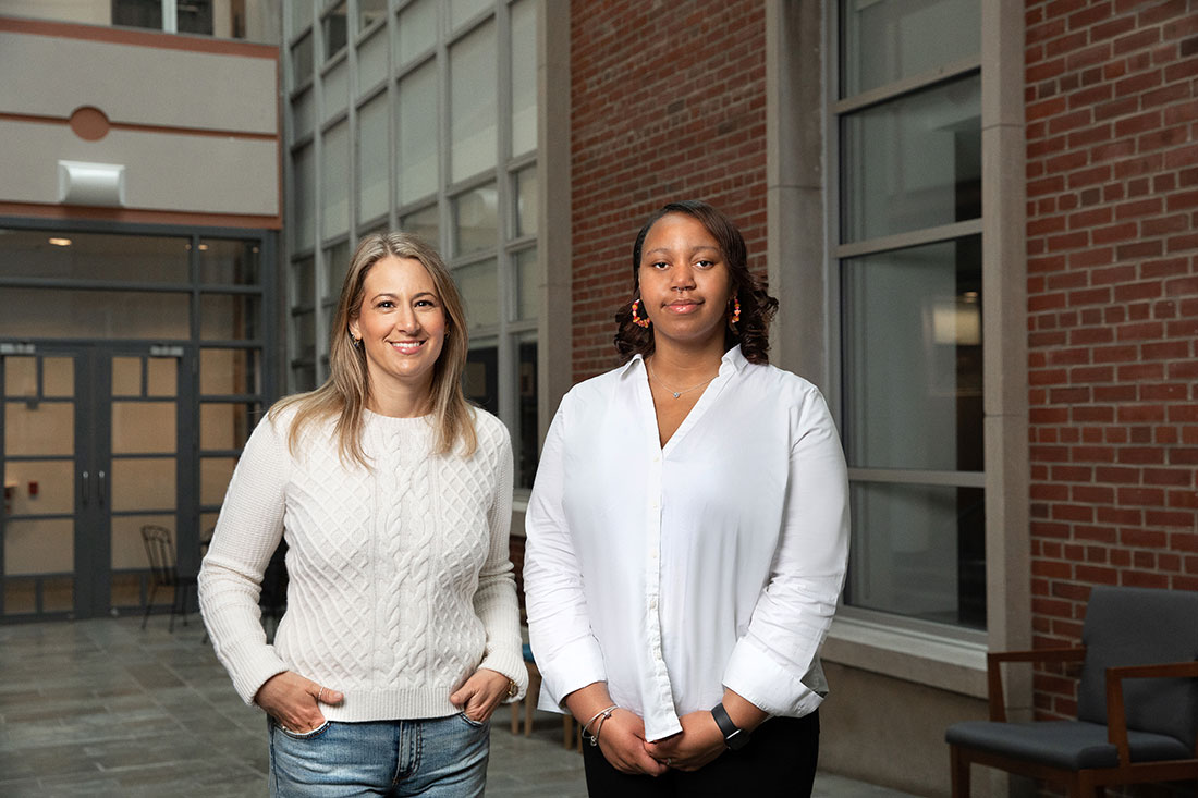 Helfstein and Montalvo stand together in a hall