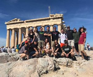 Students pose in front of the Parthenon in Greece