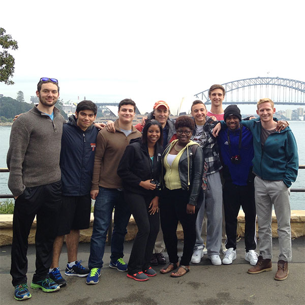 students posed at riverfront