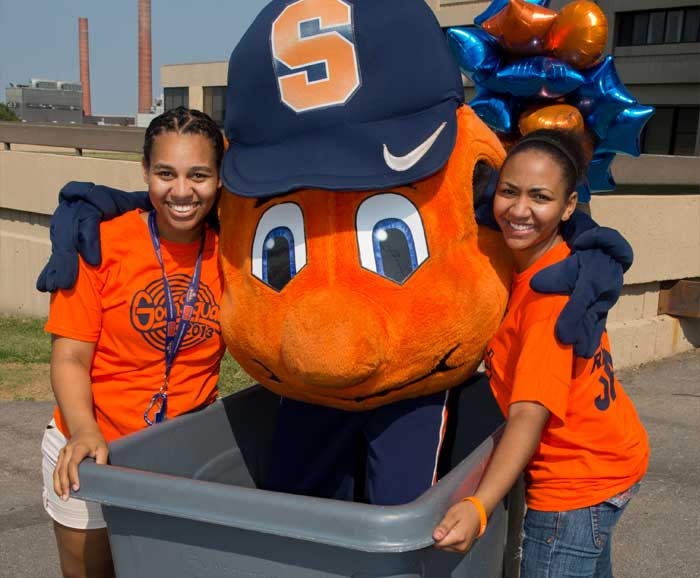 Otto with students moving in to a dorm