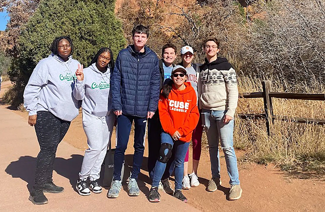 Seven students standing together outside in Colorado Springs