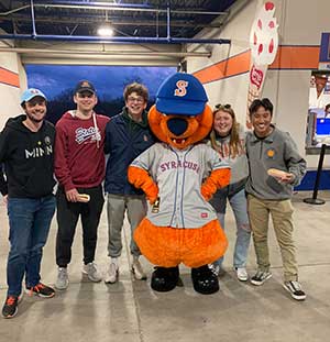 SPM Club meets Syracuse Mets mascot while attending game