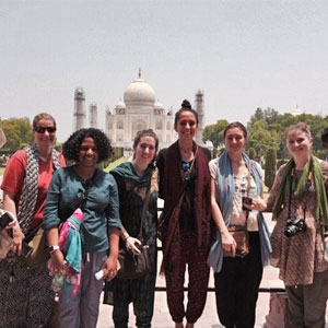 students posed at riverfront