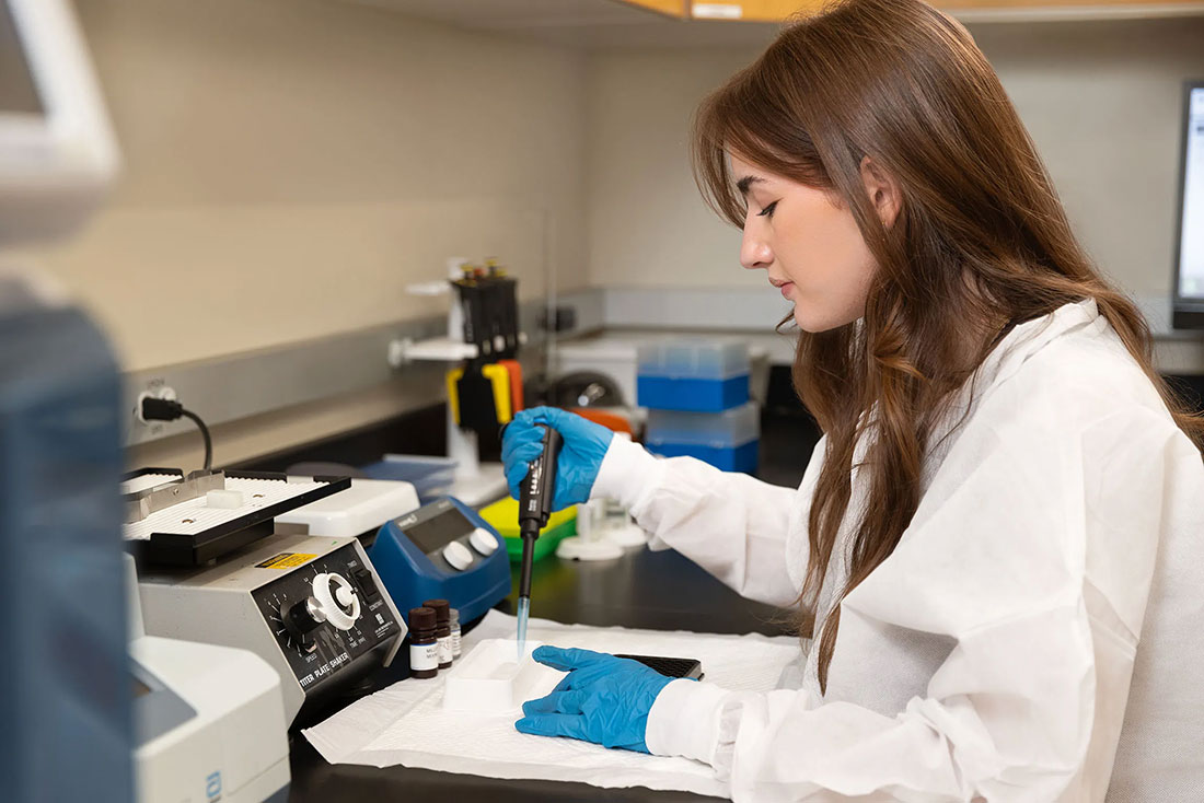 Tara doing research in a lab