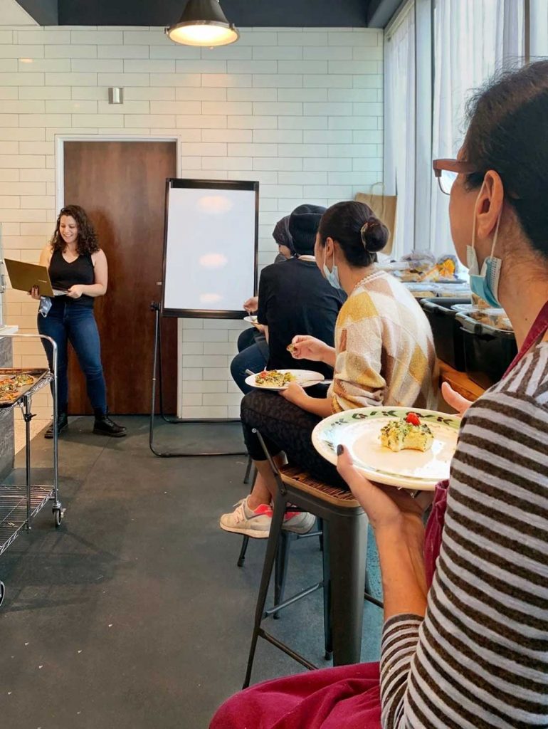 People eat while listening to a lecture