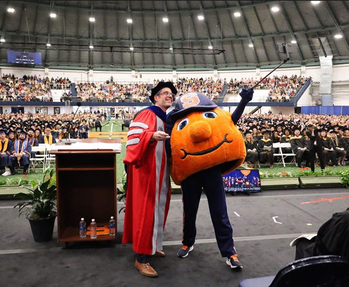 Dean Jordan and Otto standing together at Falk 2025 Convocation ceremony