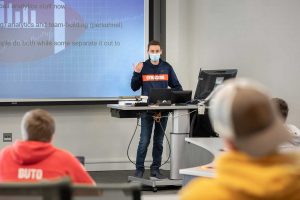 a student lectures in a classroom