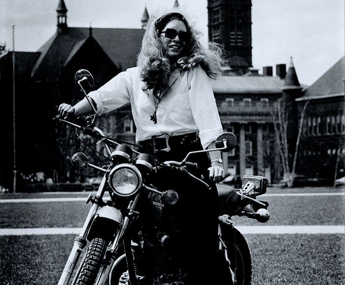 Sally Short sitting on motorcycle