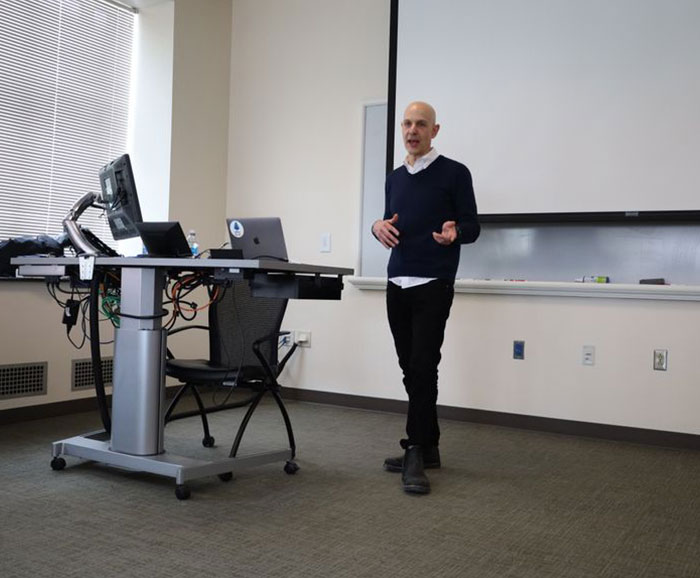 professor standing in front of classroom